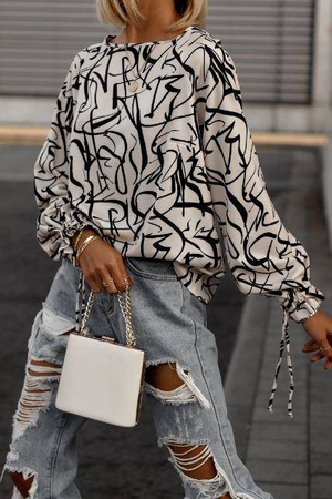 Kremowa wzorzysta bluzka damska w czarne wzory ENJOY