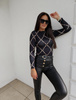 Elastyczna dopasowana bluzka damska we wzory TIME SKIN