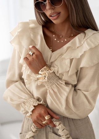 Beżowa bluzka damska z ozdobną falbaną CRYSTAL
