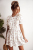 Biała sukienka z krótkim rękawem damska w delikatne wzory z falbanką LUCY